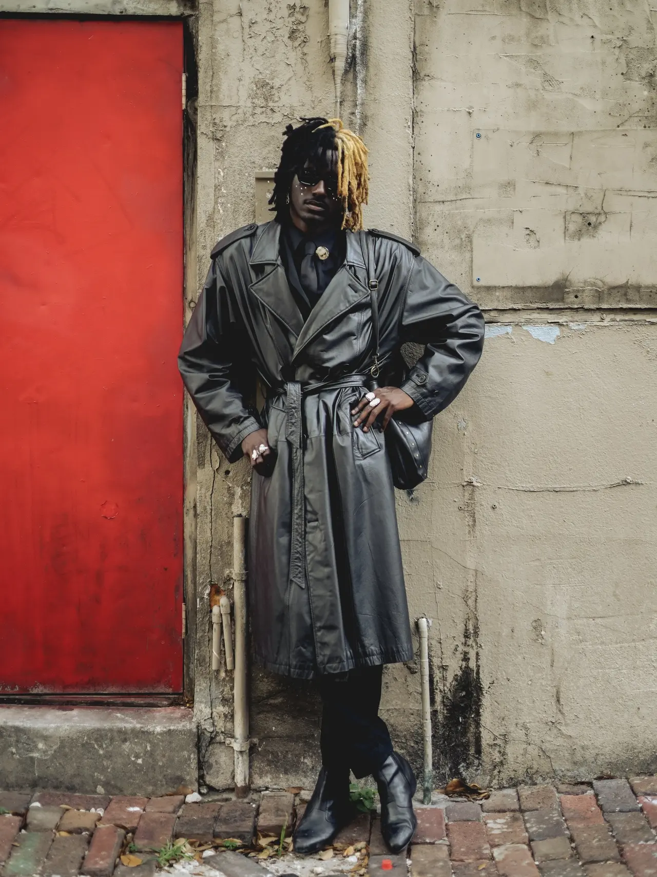 Photo by Tampa-Based Photographer on April 11, 2026. May be an image of kilt, jacket, raincoat, robe and bath robe.